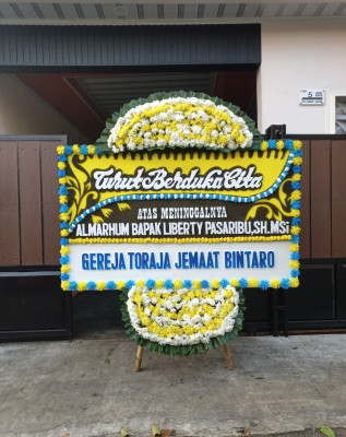 Papan Bunga Duka di Binakal